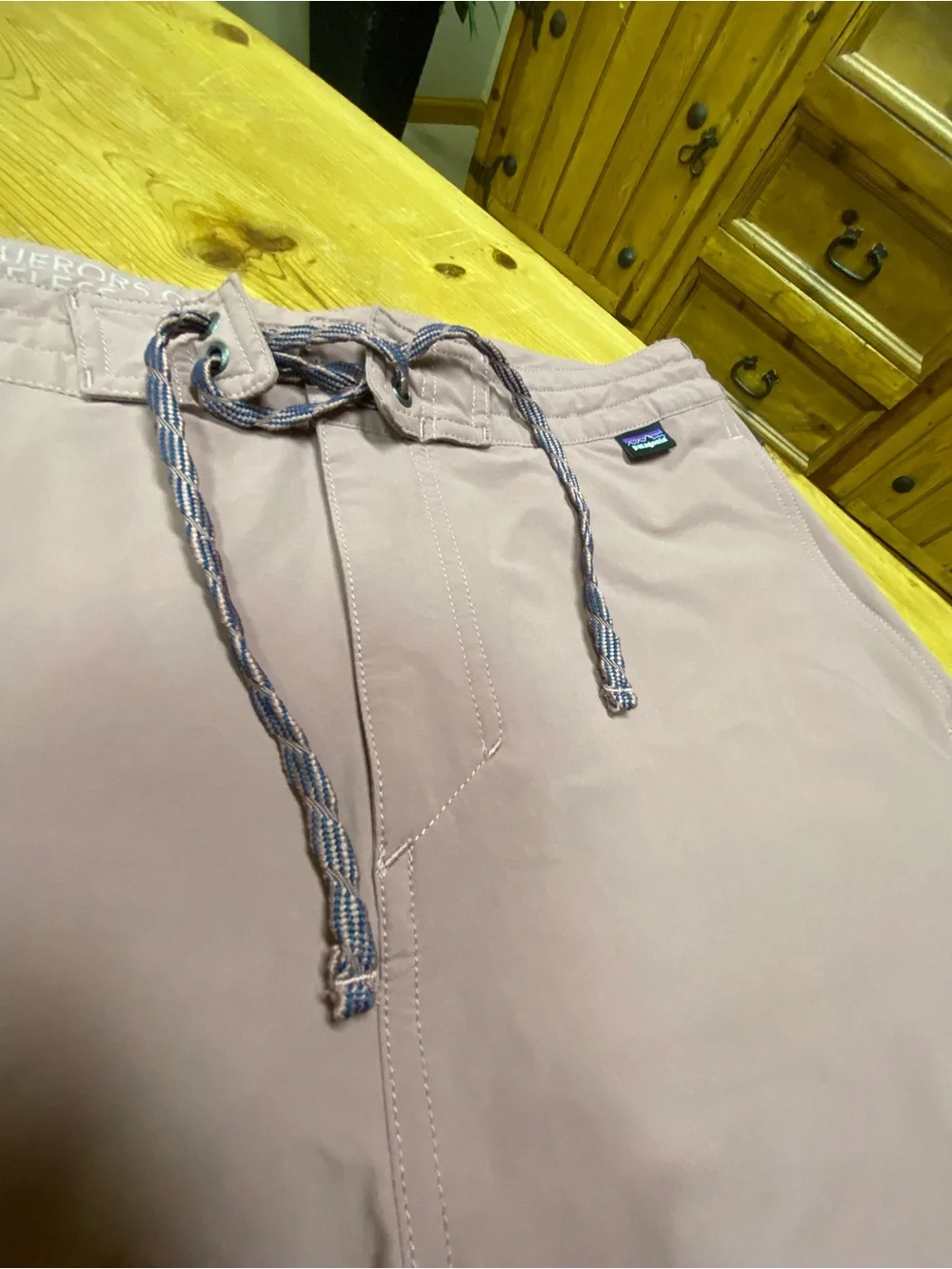 Patagonia Men’s Mauve-rose wayfarer hybrid walking shorts.